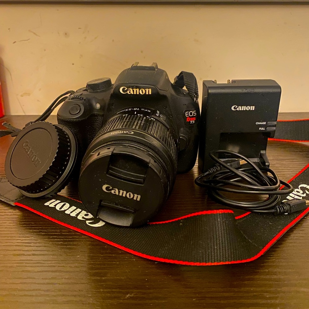 Cannon Rebel T5 with cannon zoom lens EF-S 18-55mm